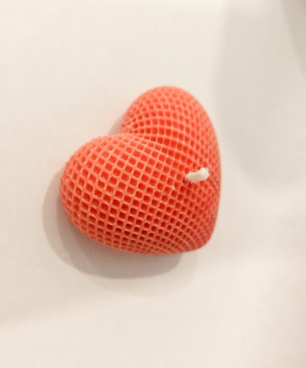 Peach heart candle