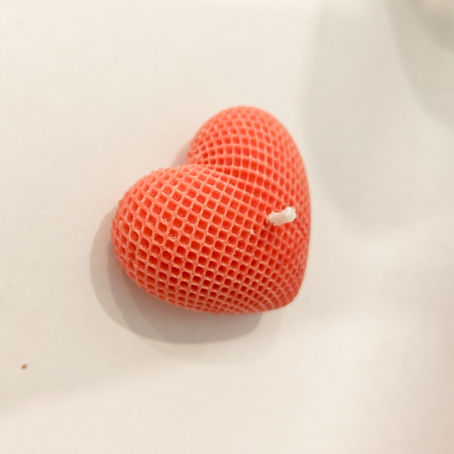 Peach heart candle